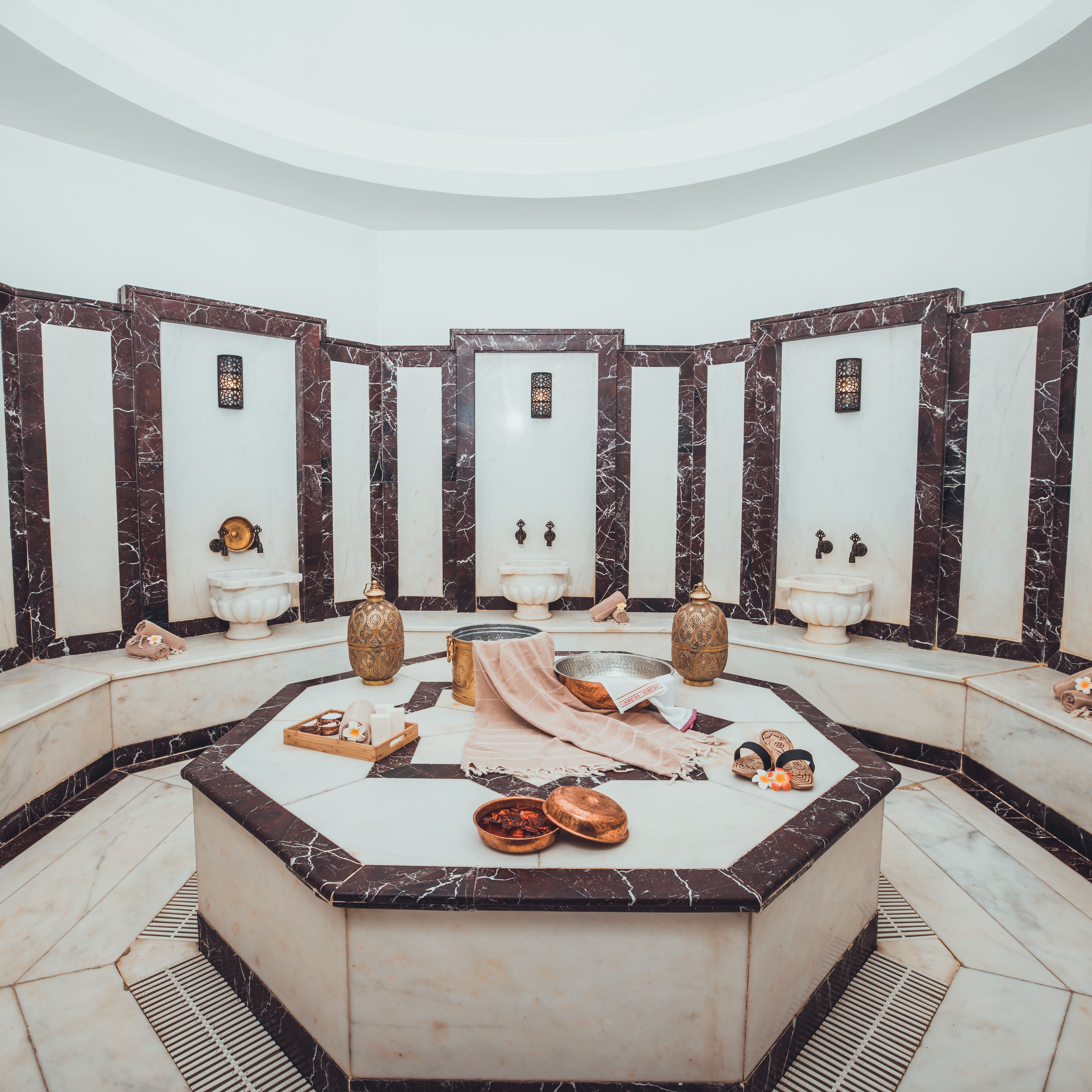 Traditional marble hammam interior with göbek taşı in Istanbul